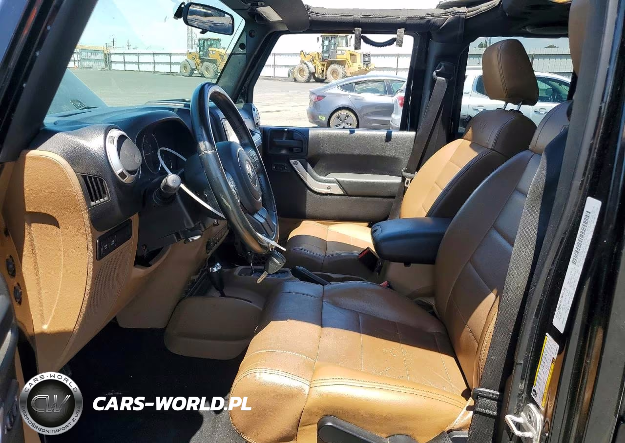 2011 Jeep Wrangler Unlimited Rubicon VIN:1J4HA6H1XBL600553 - 7
