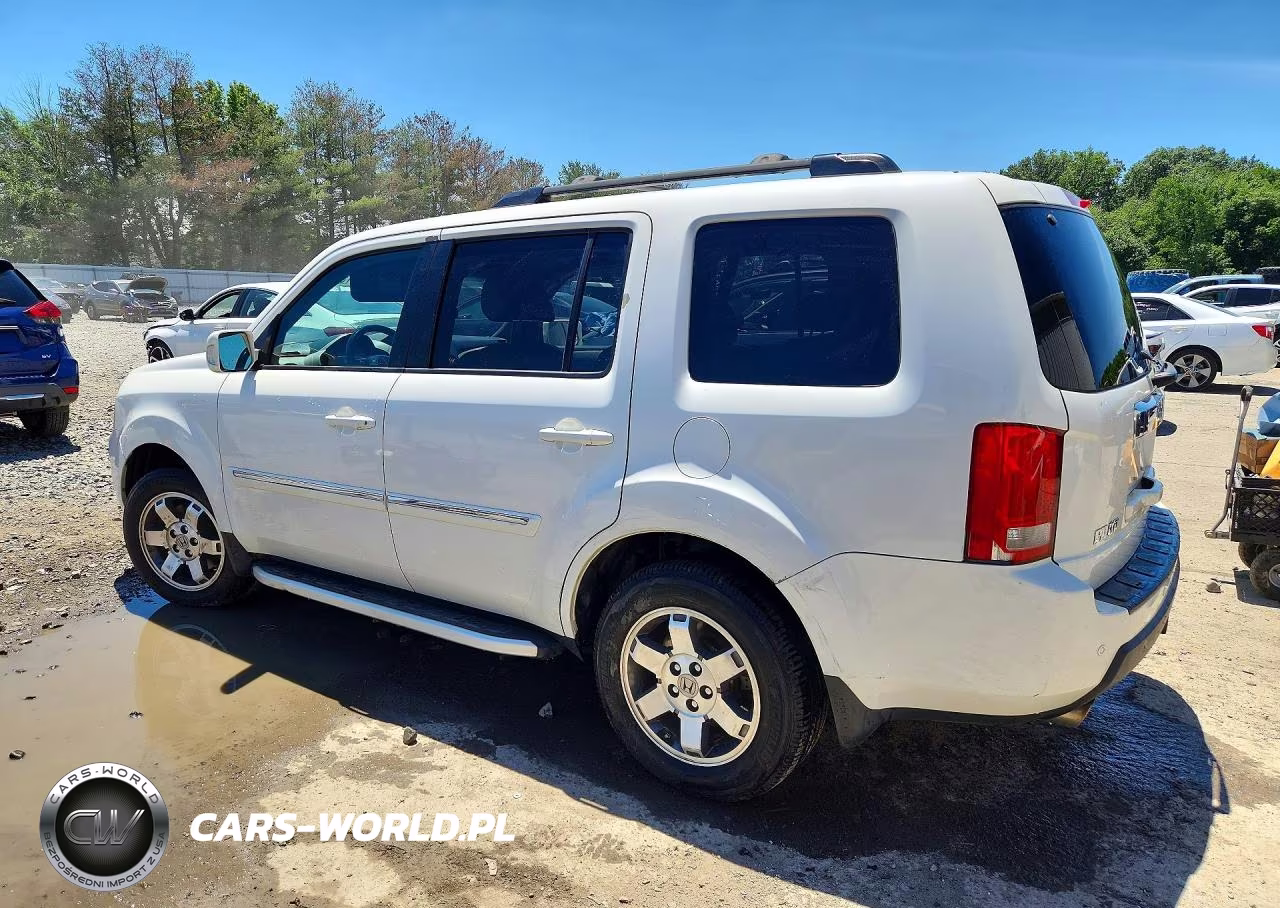 2011 Honda Pilot Touring VIN:5FNYF4H94BB036094 - 2