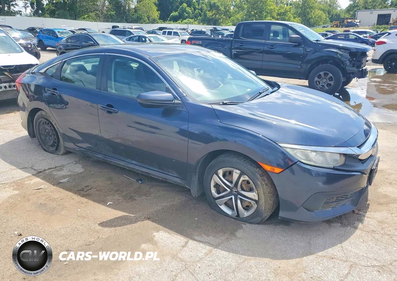 2018 Honda Civic Lx VIN:19XFC2F50JE000590 - 4