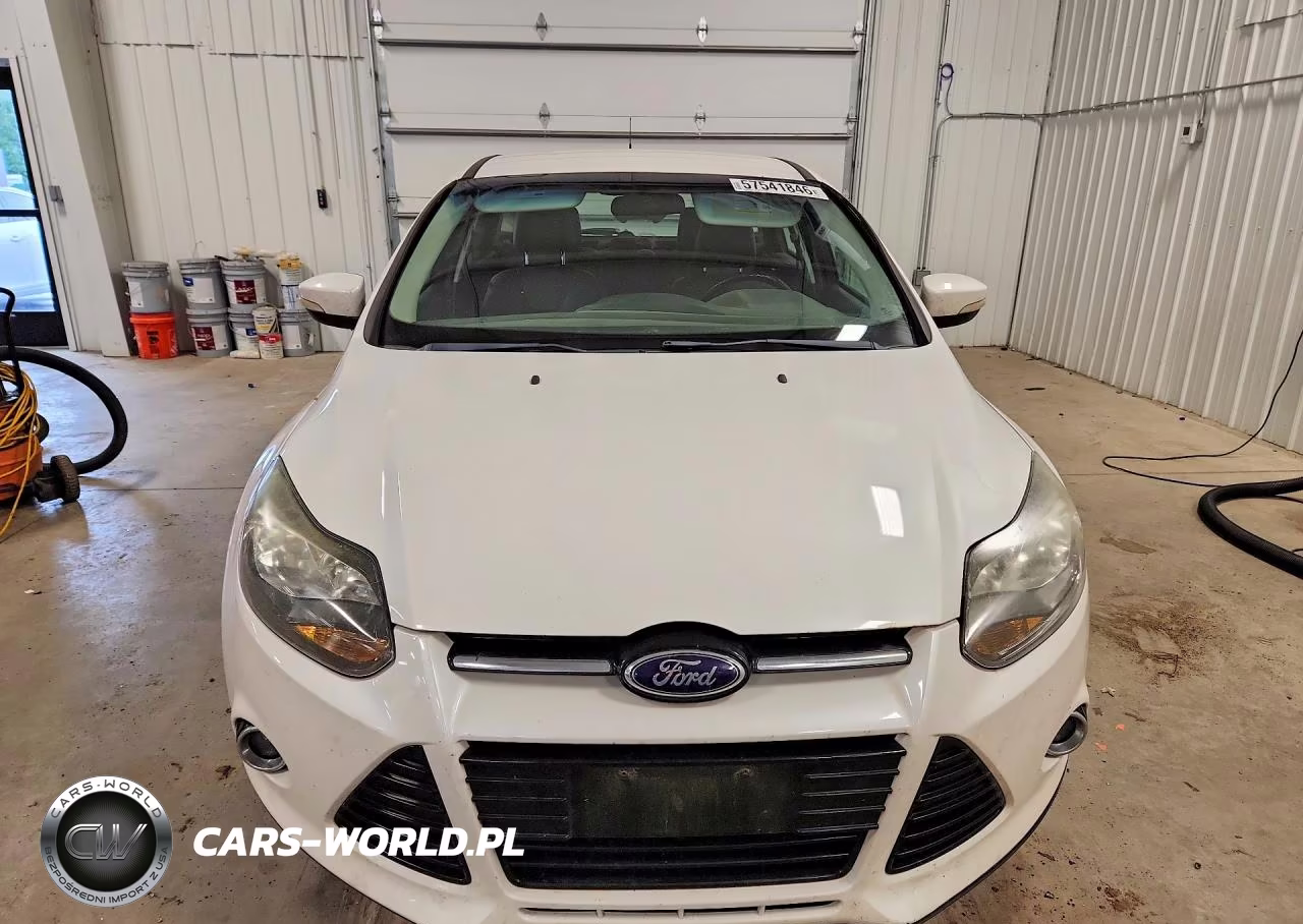 2014 Ford Focus Titanium VIN:1FADP3N25EL237314 - 5