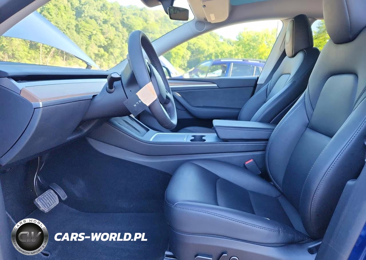2023 Tesla Model Y VIN:7SAYGDEE4PF827086 - 7
