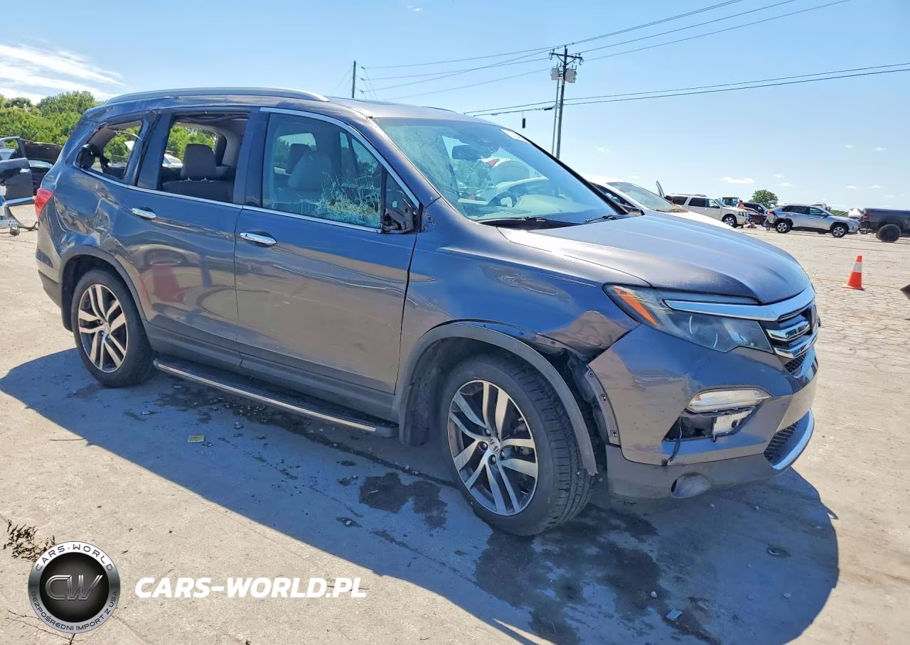 2016 Honda Pilot Elite VIN:5FNYF6H01GB123634 - 4