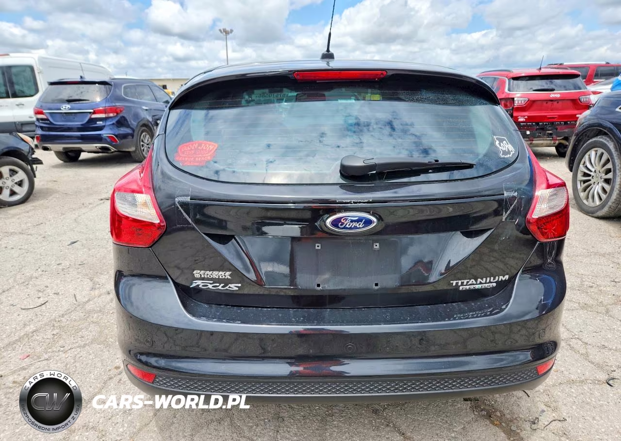 2012 Ford Focus Titanium VIN:1FAHP3N21CL464790 - 6