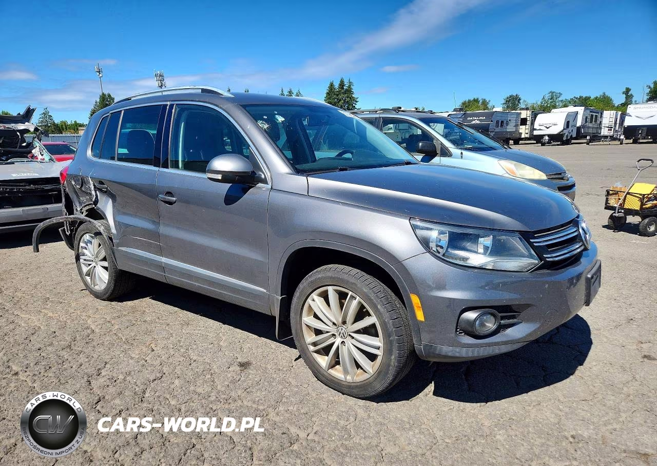 2014 Volkswagen Tiguan S VIN:WVGBV3AX7EW559231 - 4