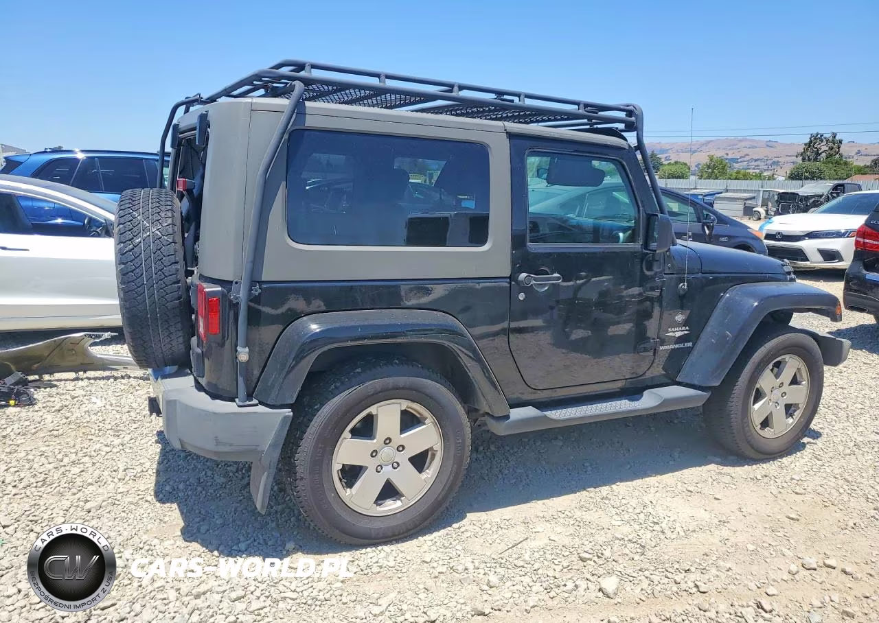 2010 Jeep Wrangler Sahara VIN:1J4AA5D11AL215818 - 3