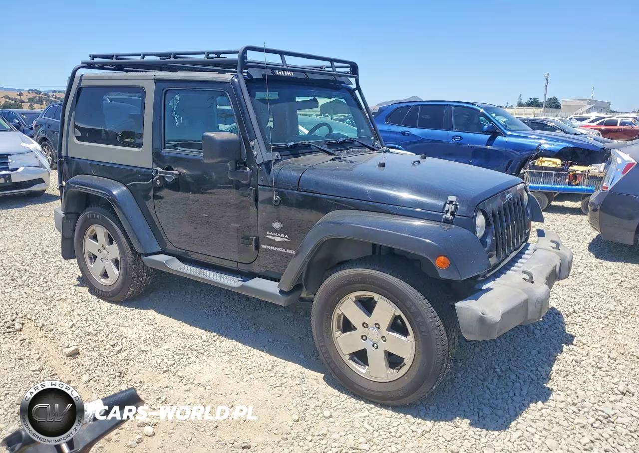 2010 Jeep Wrangler Sahara VIN:1J4AA5D11AL215818 - 4