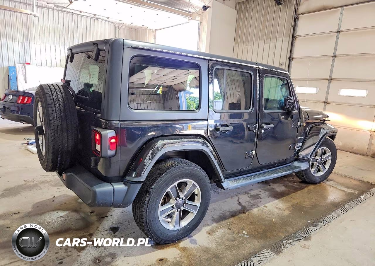 2019 Jeep Wrangler Unlimited Sahara VIN:1C4HJXEN1KW593025 - 3