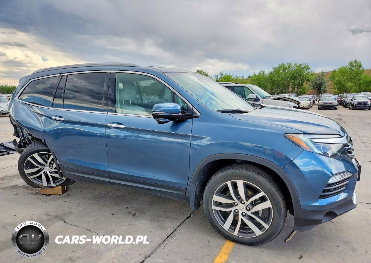 2017 Honda Pilot Touring VIN:5FNYF6H92HB065887 - 4