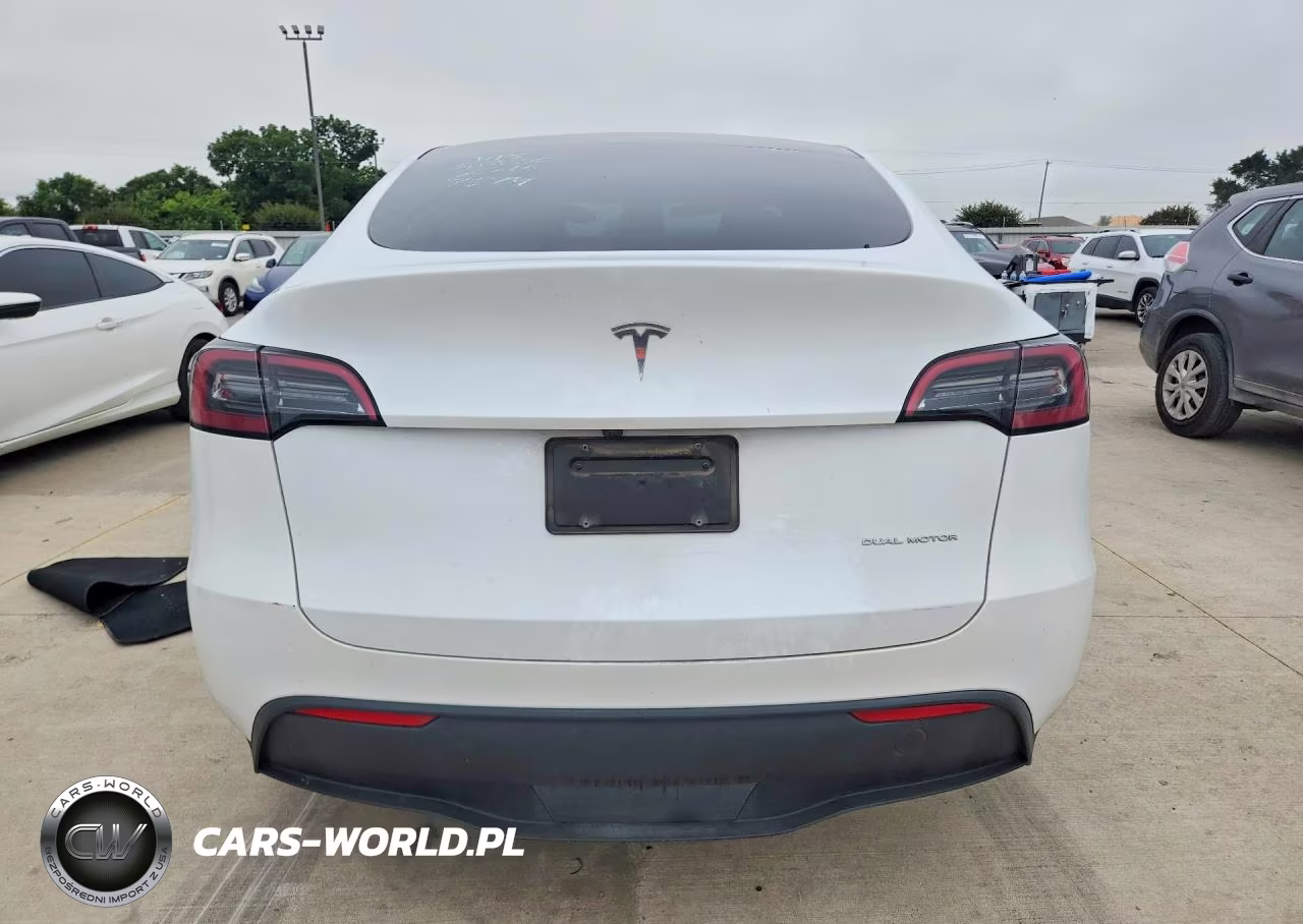 2023 Tesla Model Y VIN:7SAYGDEE4PA137674 - 6