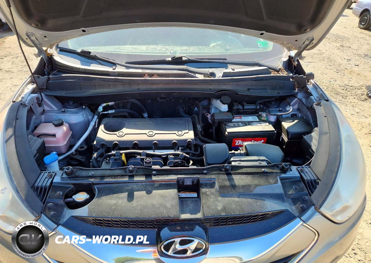 2012 Hyundai Tucson Limited VIN:KM8JU3AC9CU324107 - 12