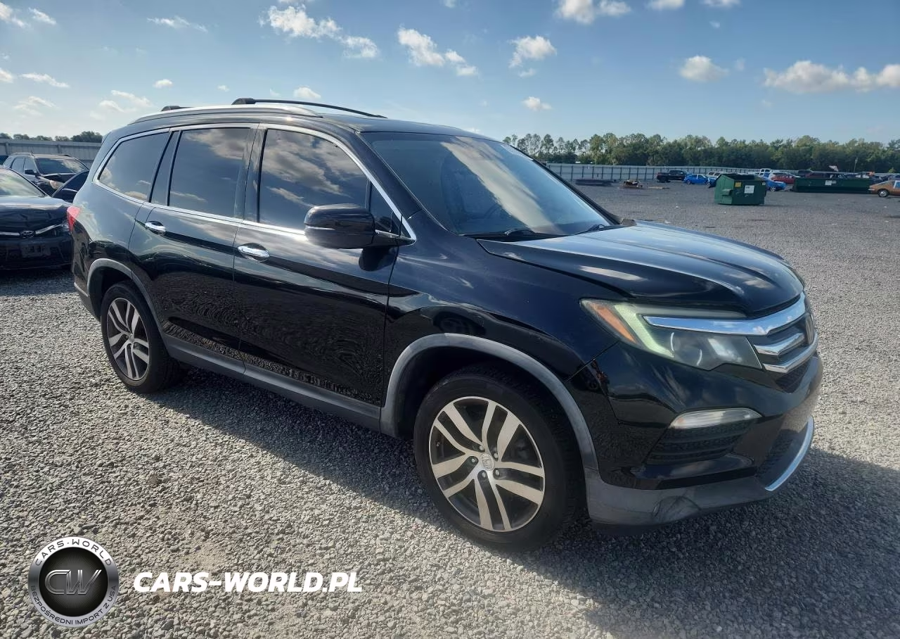 2016 Honda Pilot Elite VIN:5FNYF6H04GB075806 - 4