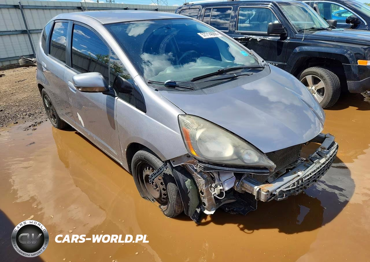 2009 Honda Fit VIN:JHMGE88229S006161 - 4