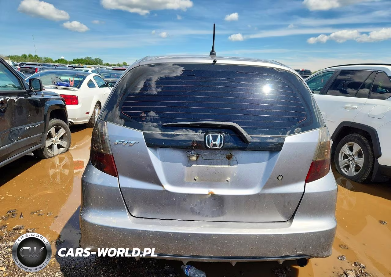 2009 Honda Fit VIN:JHMGE88229S006161 - 6