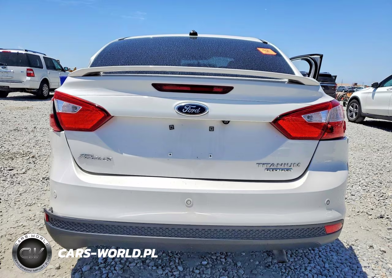 2013 Ford Focus Titanium VIN:1FADP3J23DL144862 - 6