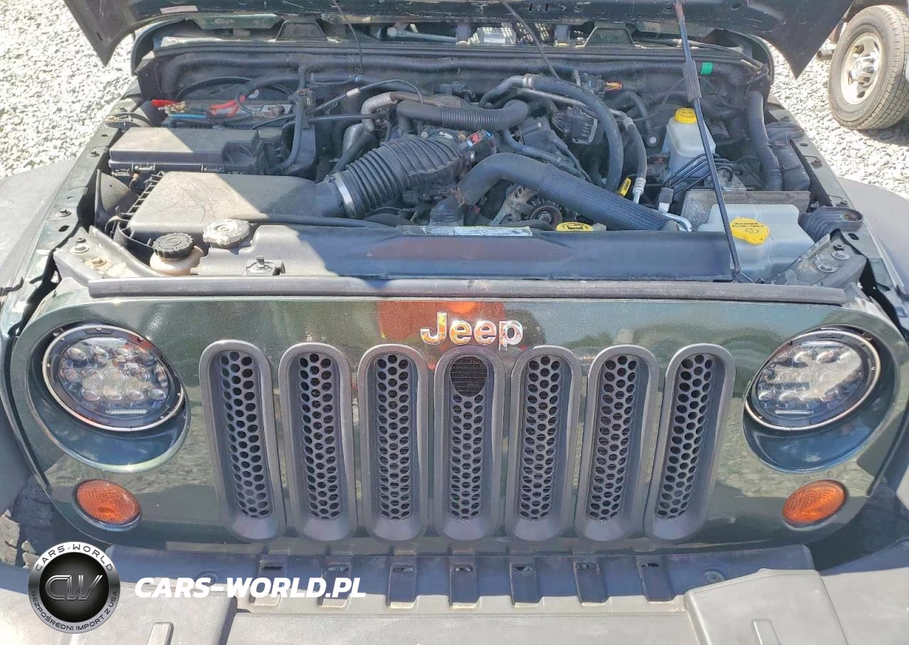 2011 Jeep Wrangler Unlimited Sport VIN:1J4BA3H18BL581943 - 11