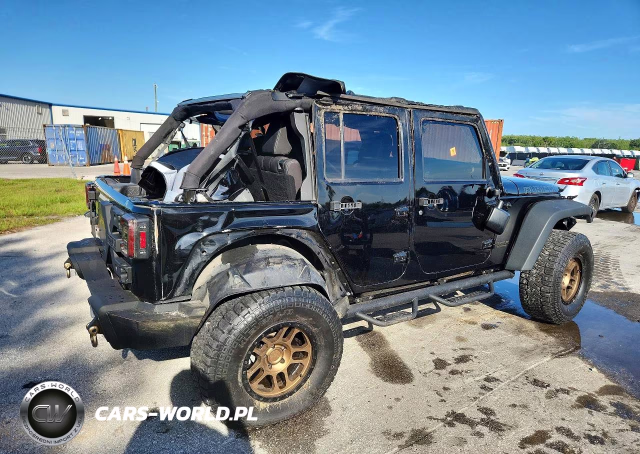 2014 Jeep Wrangler Unlimited Rubicon VIN:1C4BJWFG9EL290970 - 3