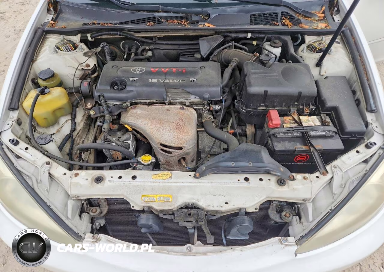 2002 Toyota Camry Le VIN:JTDBE32K320007733 - 11