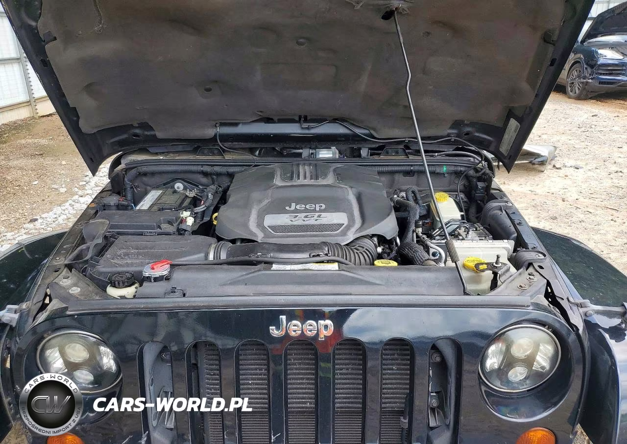 2012 Jeep Wrangler Unlimited Sahara VIN:1C4HJWEG7CL124729 - 11