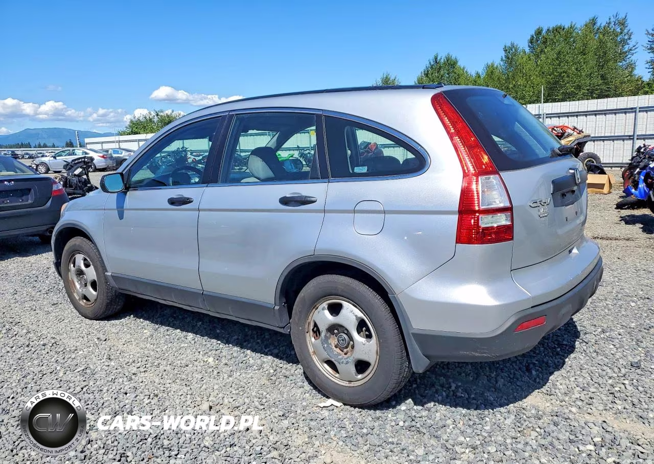 2009 Honda Cr-V Lx VIN:3CZRE38329G704390 - 2