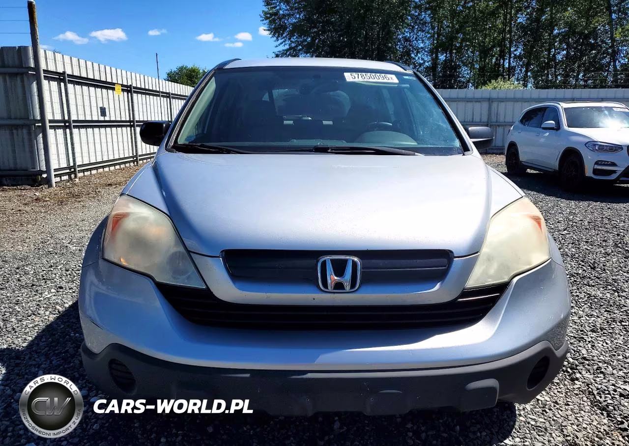 2009 Honda Cr-V Lx VIN:3CZRE38329G704390 - 5