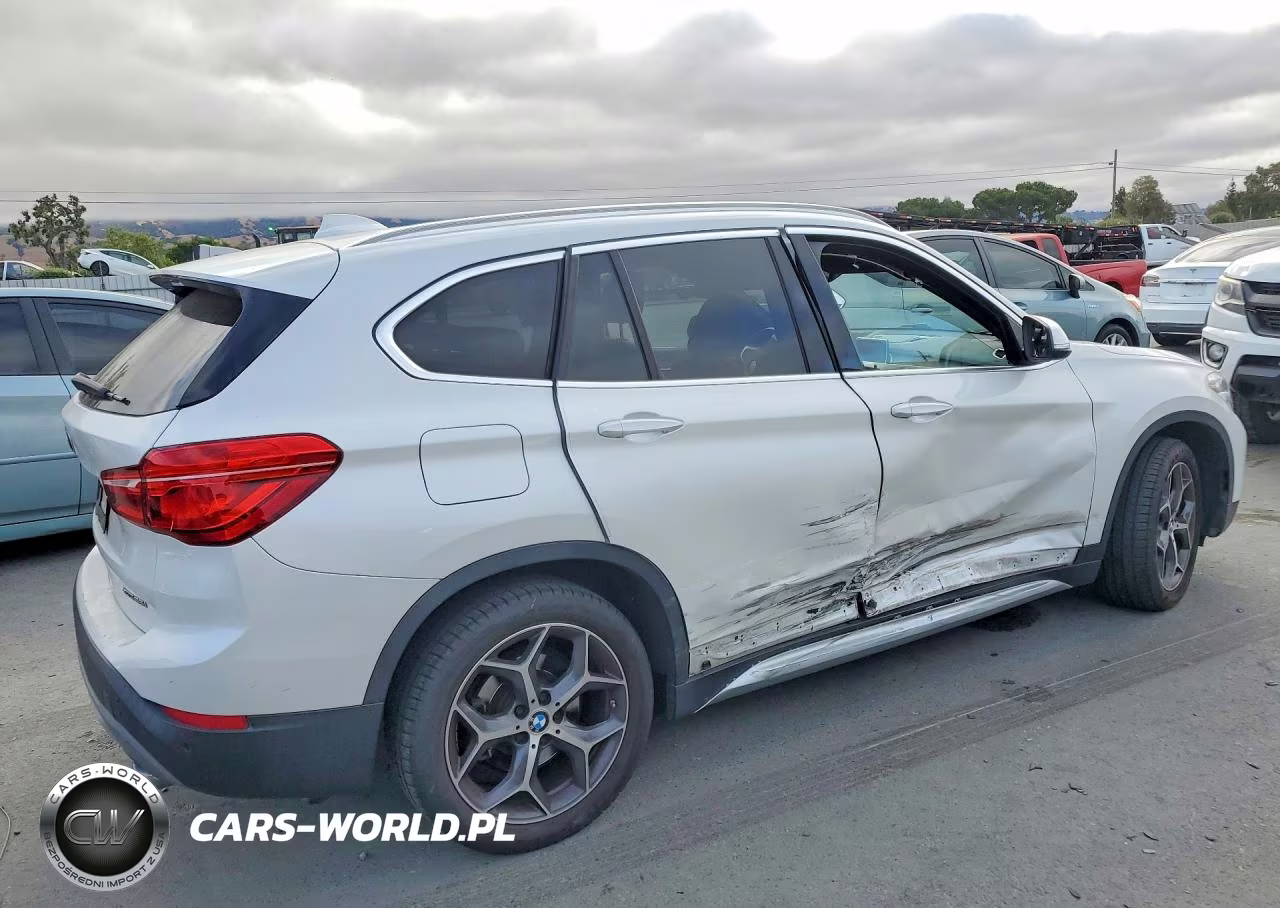 2018 BMW X1 xDrive28I VIN:WBXHT3C31J5L27502 - 3