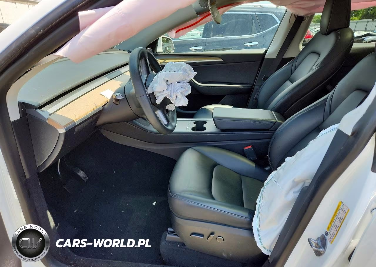 2023 Tesla Model Y VIN:7SAYGDEE4PA075385 - 7