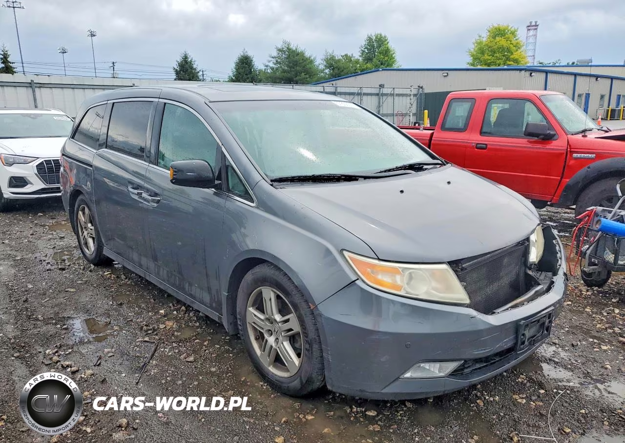 2012 Honda Odyssey Touring VIN:5FNRL5H97CB021996 - 4