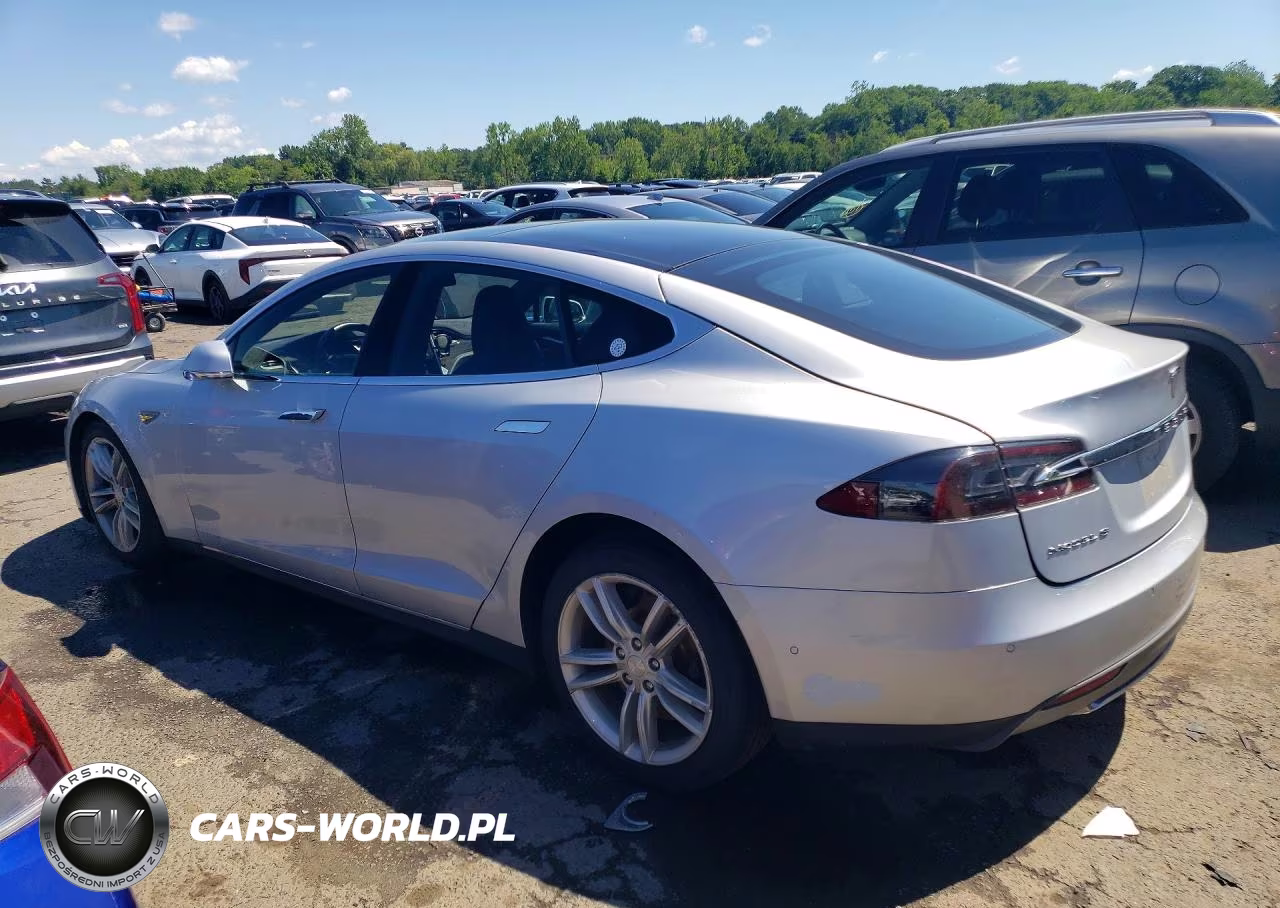 2015 Tesla Model S VIN:5YJSA1E24FF112932 - 2