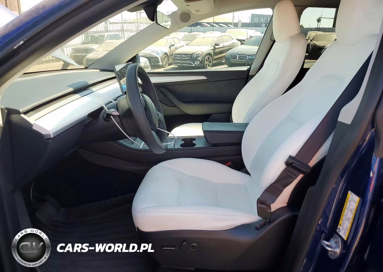 2024 Tesla Model Y VIN:7SAYGAEE7RF184296 - 7