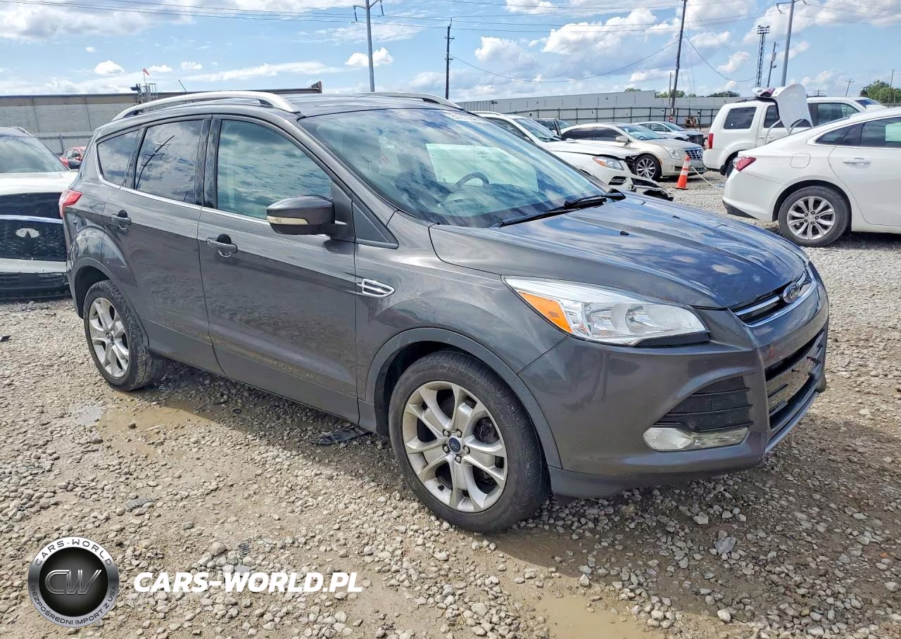 2016 Ford Escape Titanium VIN:1FMCU9J9XGUA36604 - 4