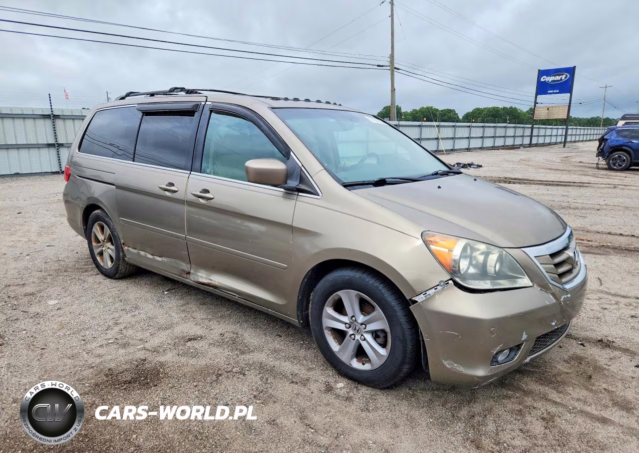 2010 Honda Odyssey Touring VIN:5FNRL3H95AB004924 - 4