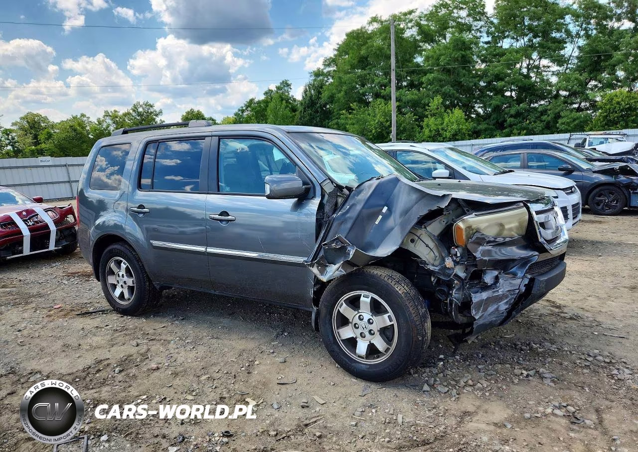 2011 Honda Pilot Touring VIN:5FNYF4H92BB100830 - 4