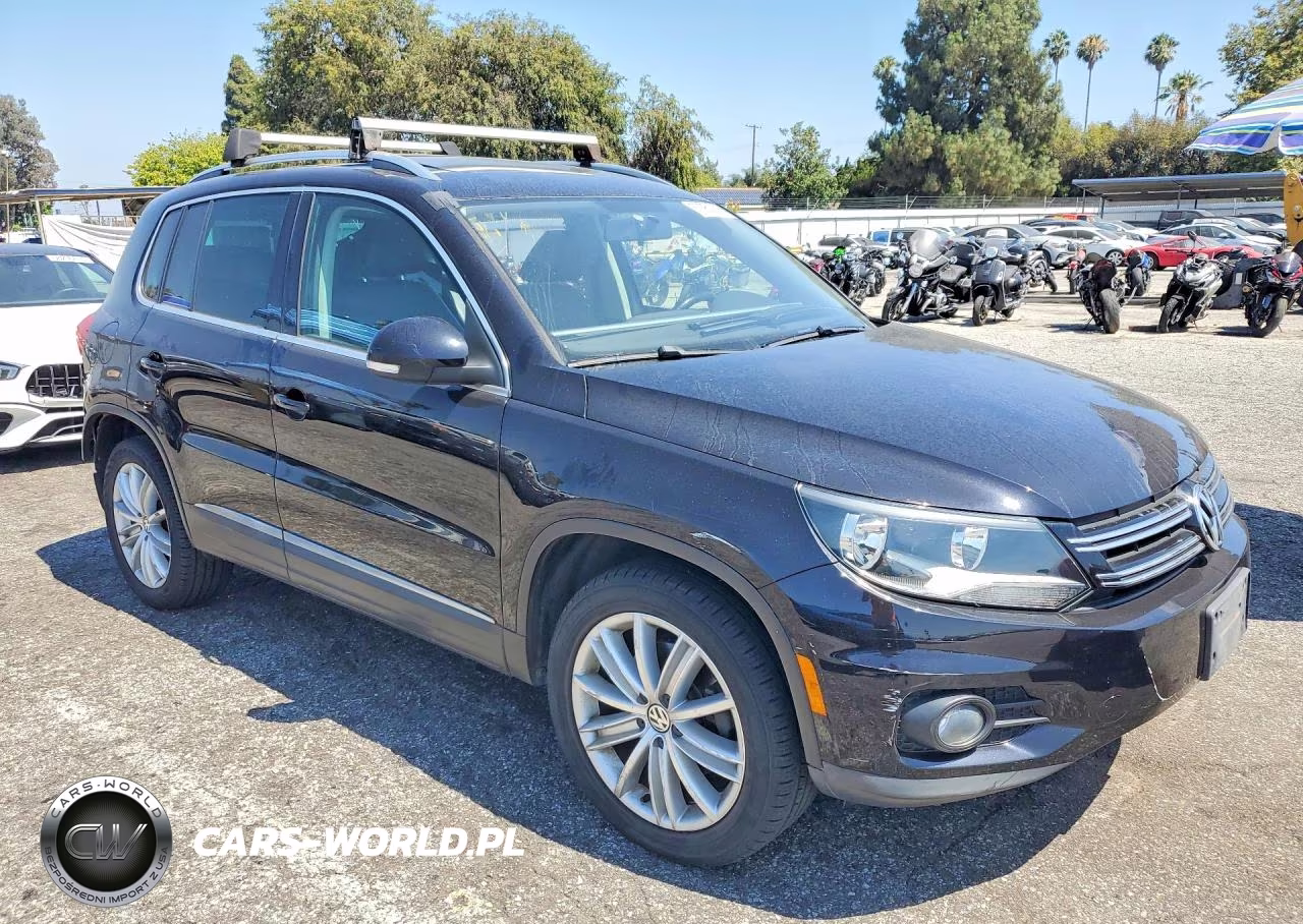 2014 Volkswagen Tiguan S VIN:WVGAV3AX1EW509839 - 4