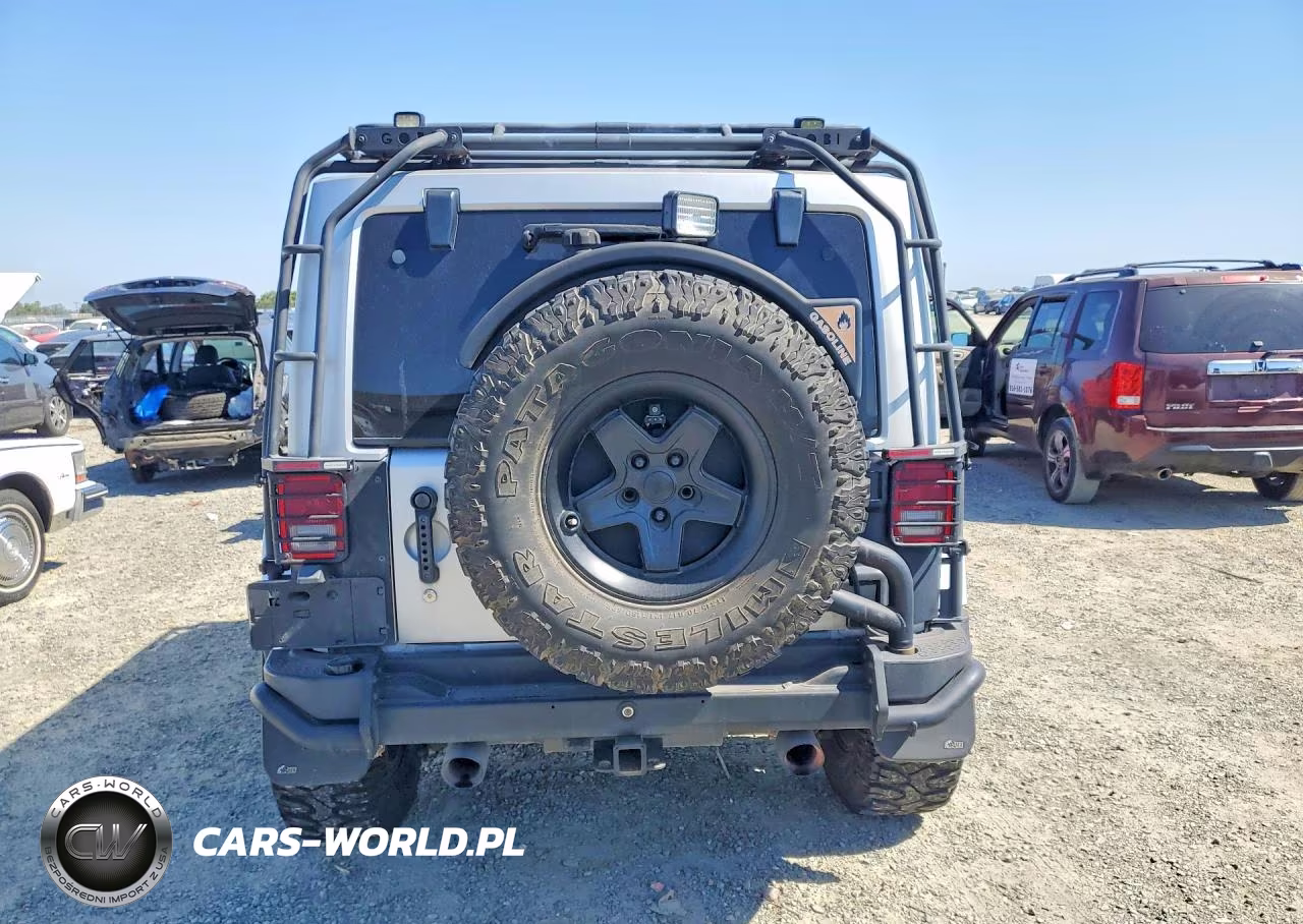 2011 Jeep Wrangler Unlimited Sahara VIN:1J4BA5H14BL547087 - 6