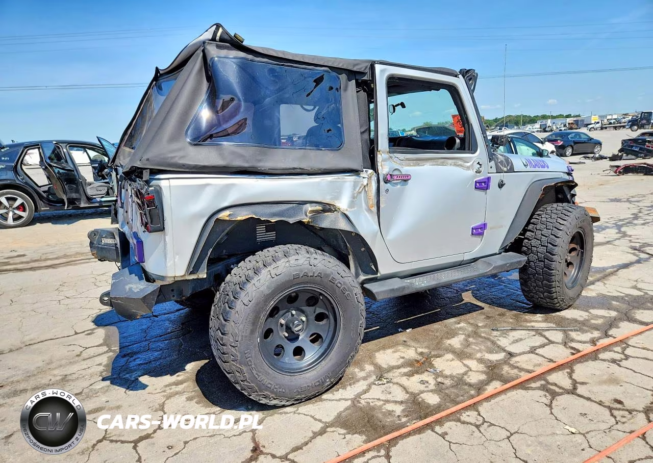 2011 Jeep Wrangler Sahara VIN:1J4AA5D12BL524084 - 3