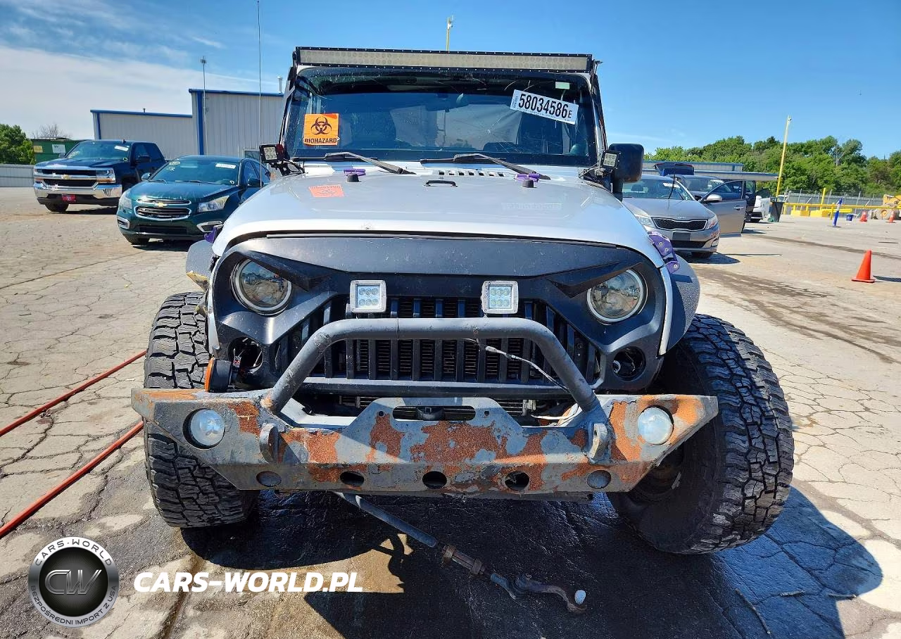 2011 Jeep Wrangler Sahara VIN:1J4AA5D12BL524084 - 5