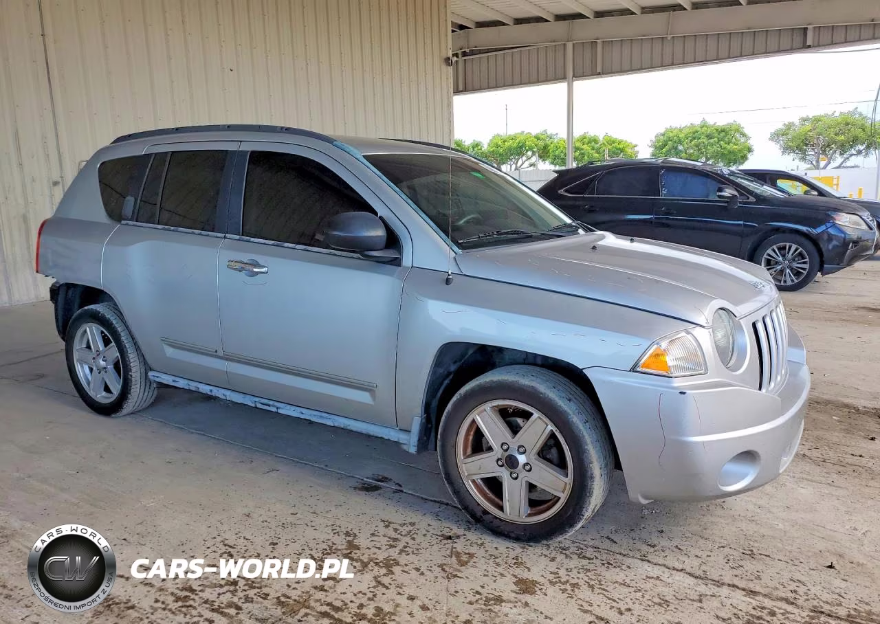 2010 Jeep Compass Sport VIN:1J4NT4FB8AD600301 - 4
