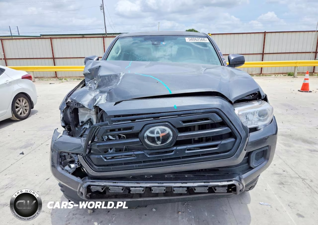 2018 Toyota Tacoma Sr VIN:5TFAX5GN8JX110494 - 5
