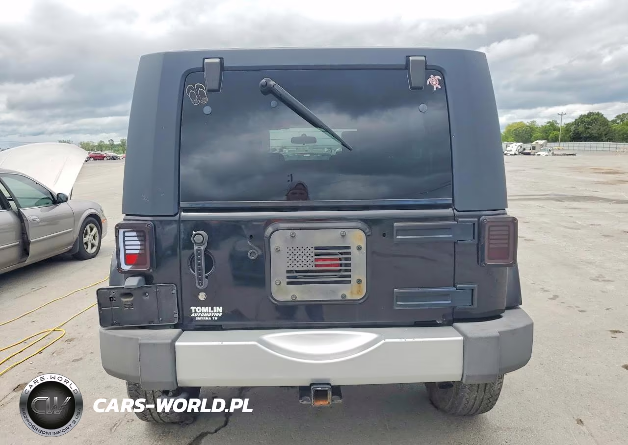 2010 Jeep Wrangler Unlimited Sahara VIN:1J4BA5H13AL123480 - 6