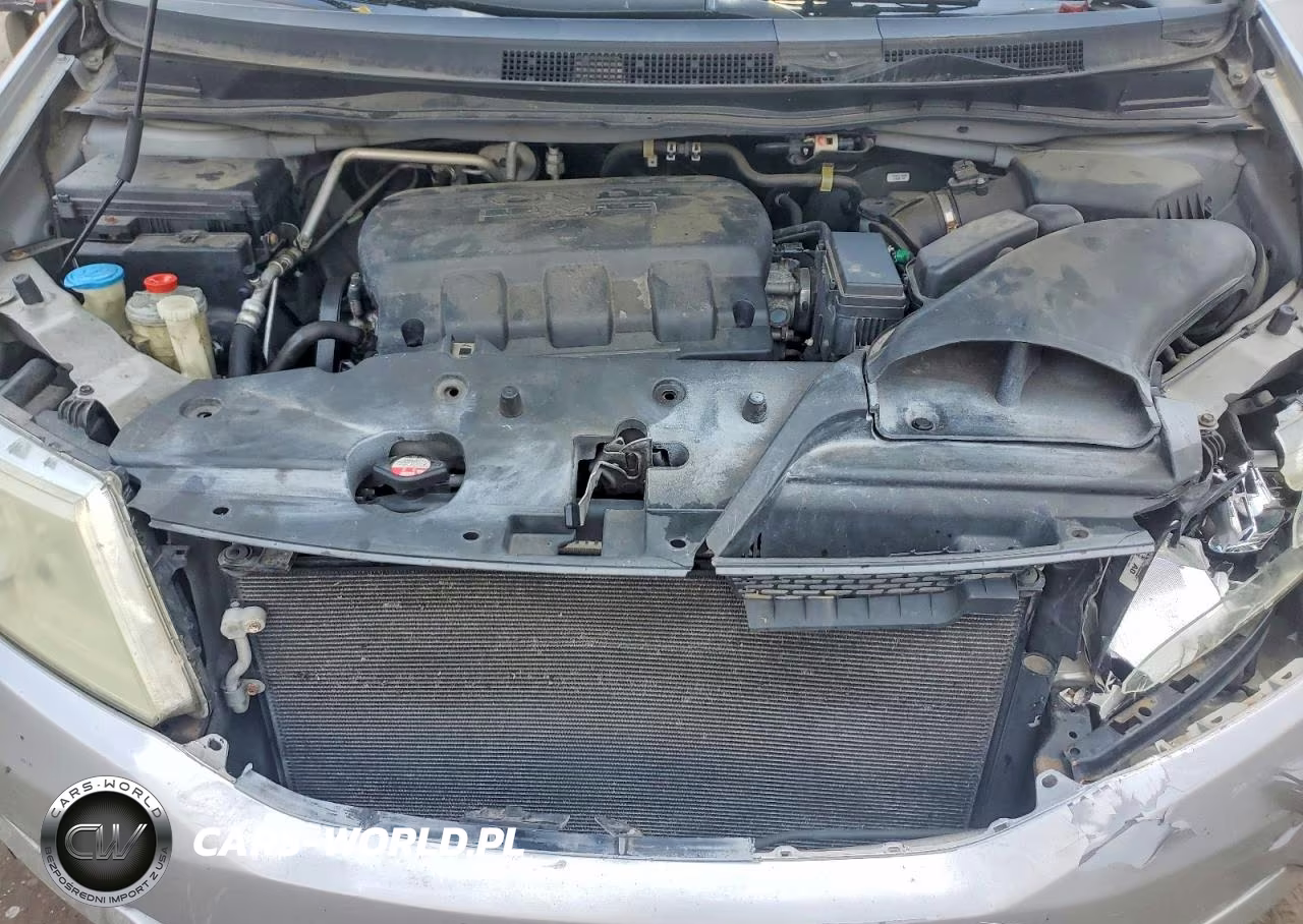 2011 Honda Odyssey Touring VIN:5FNRL5H93BB090067 - 12