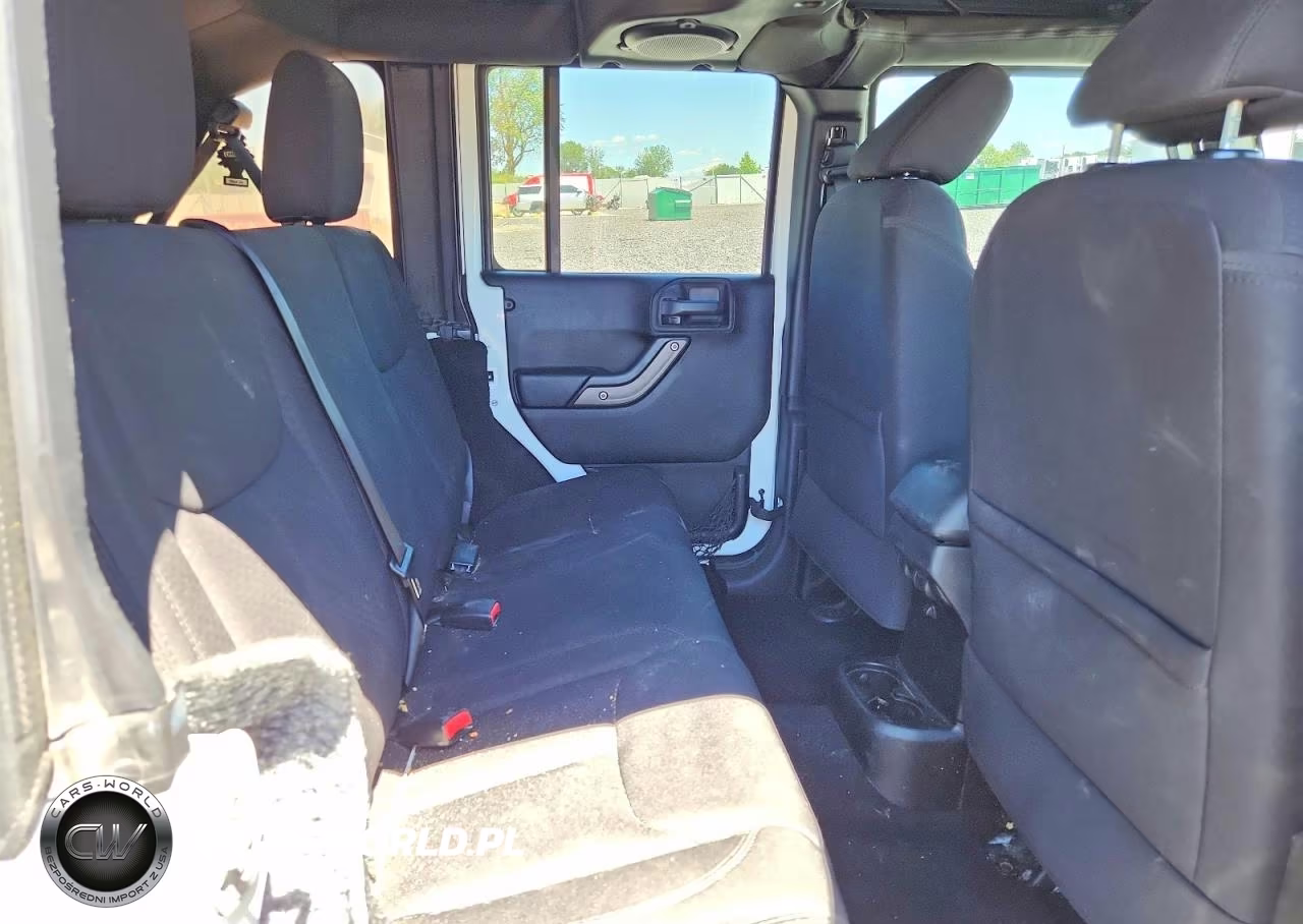 2013 Jeep Wrangler Unlimited Sport VIN:1C4BJWDG9DL654614 - 10