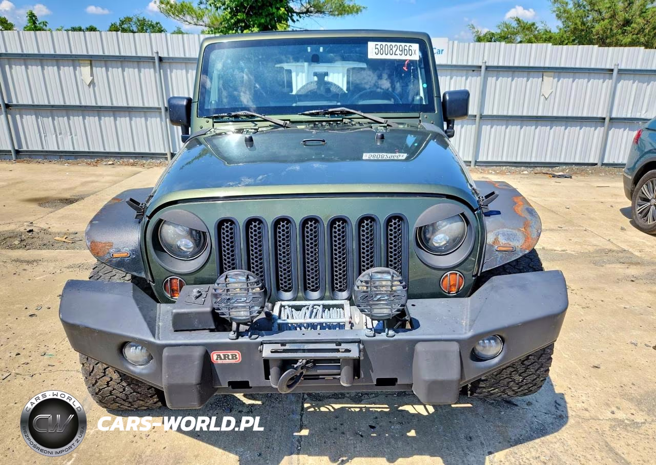 2009 Jeep Wrangler Unlimited Sahara VIN:1J4GA59199L733965 - 5
