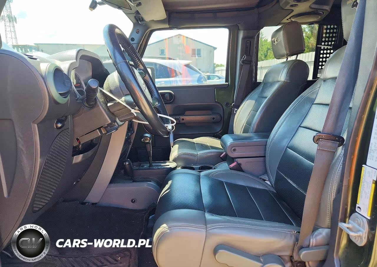 2009 Jeep Wrangler Unlimited Sahara VIN:1J4GA59199L733965 - 7