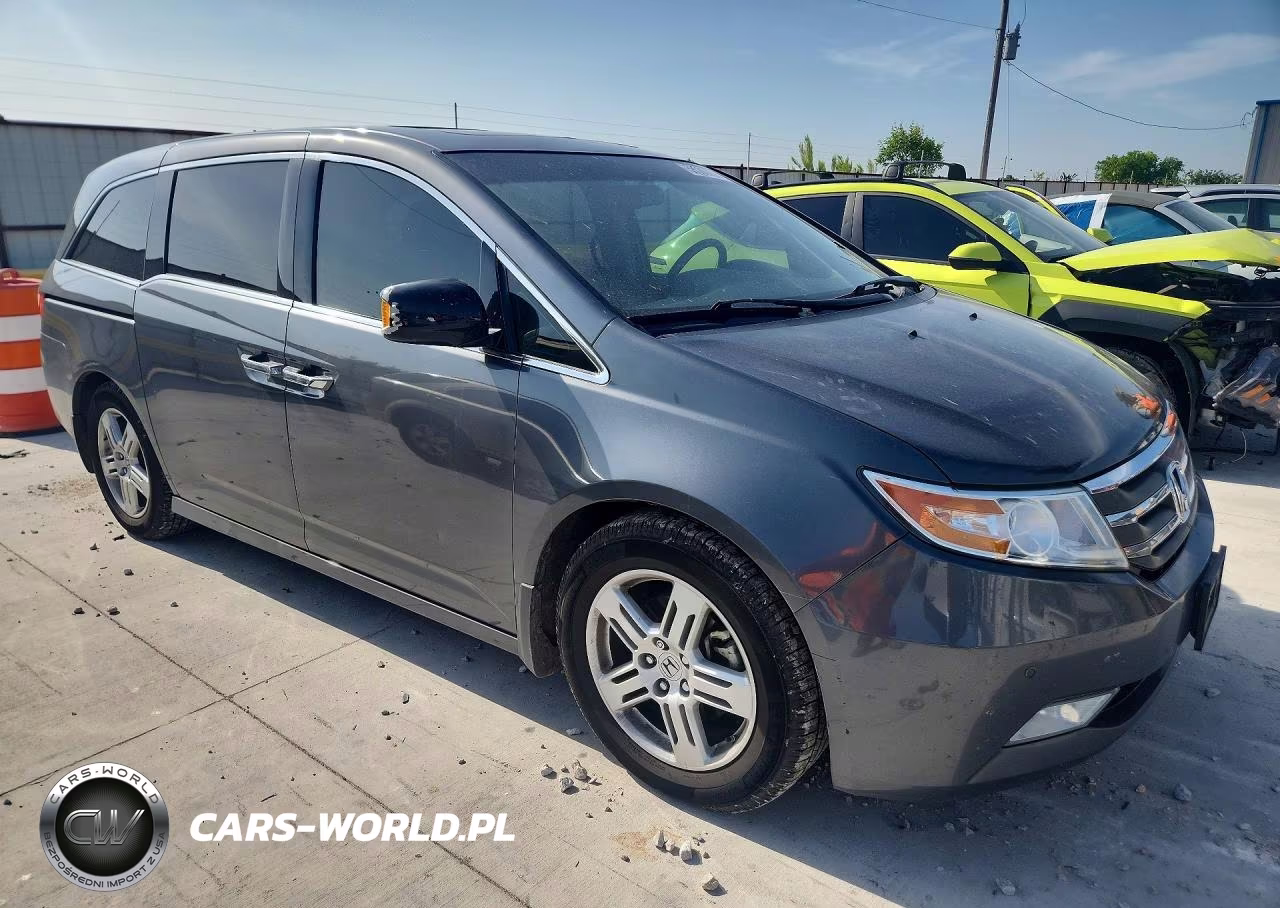 2012 Honda Odyssey Touring VIN:5FNRL5H97CB127736 - 4