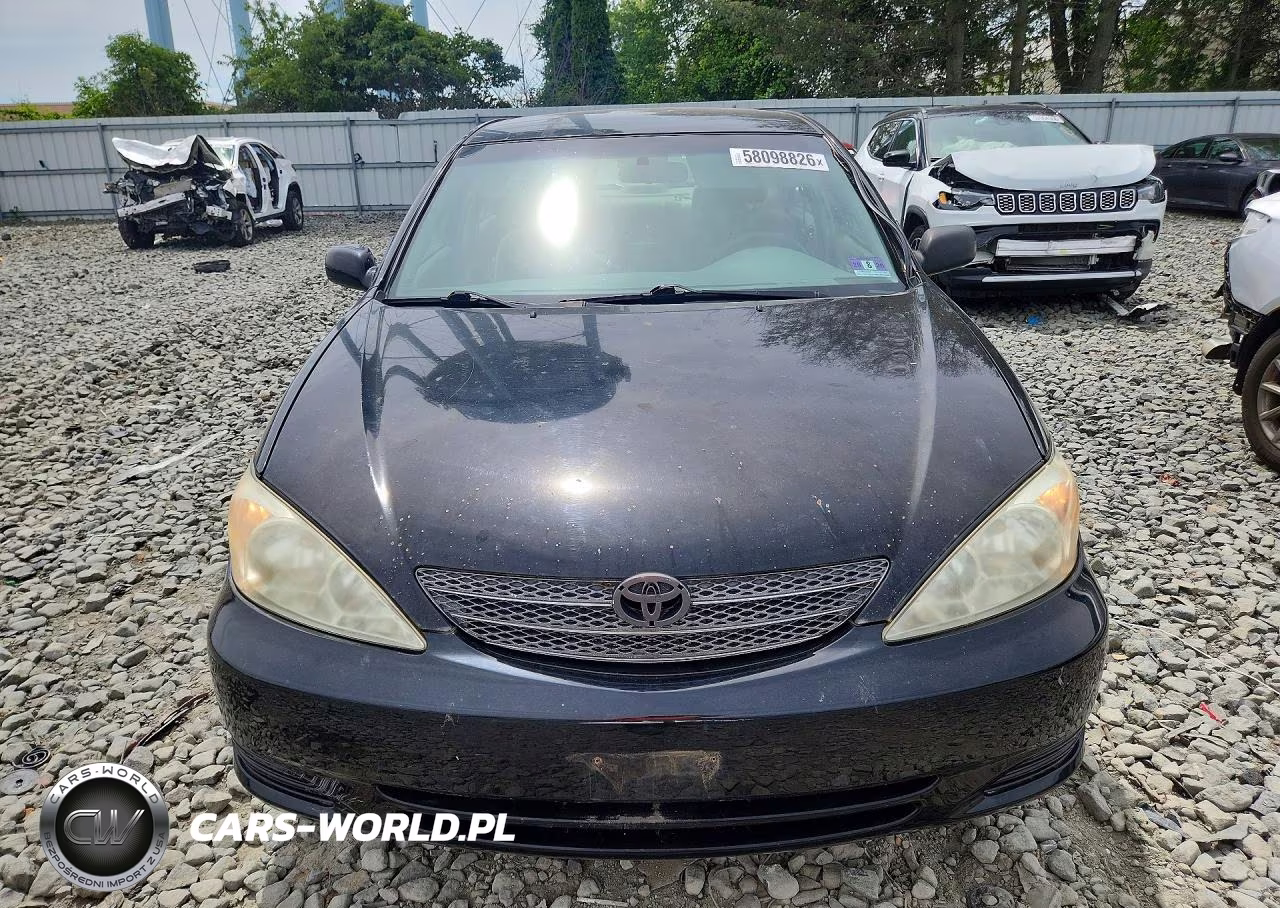 2004 Toyota Camry Le VIN:JTDBE32K140261377 - 5