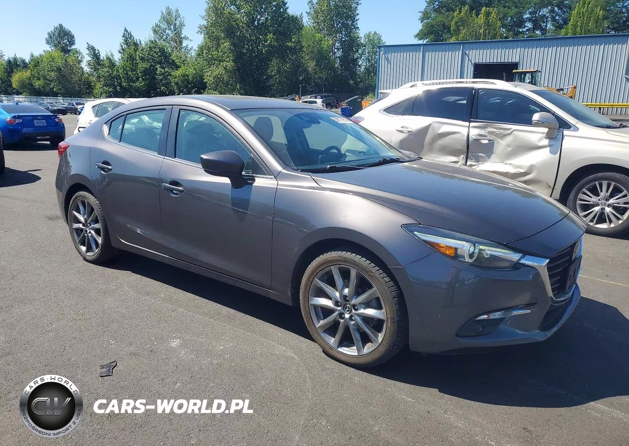2018 Mazda 3 Grand Touring VIN:3MZBN1W31JM174673 - 4