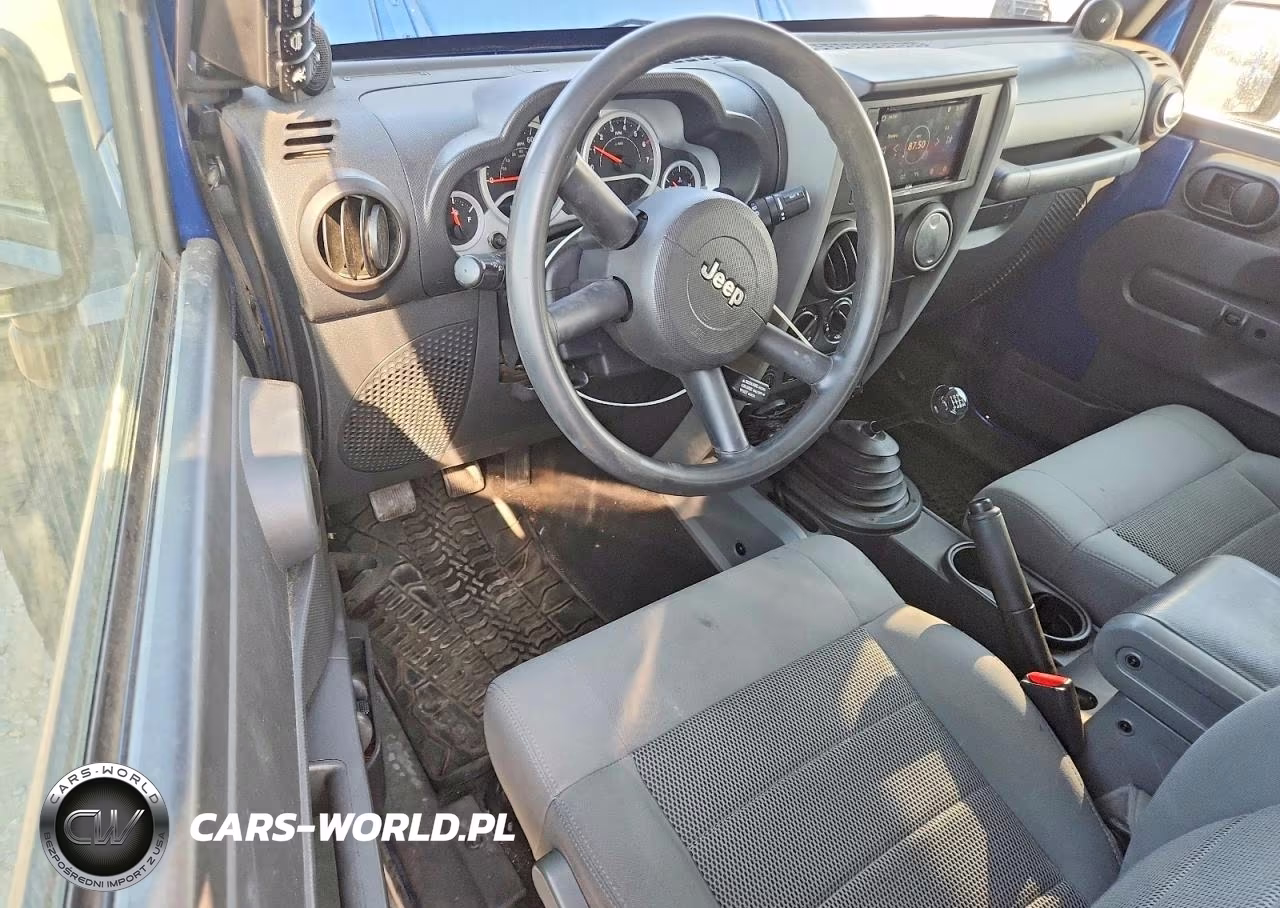 2009 Jeep Wrangler Rubicon VIN:1J8GA641X9L755985 - 8