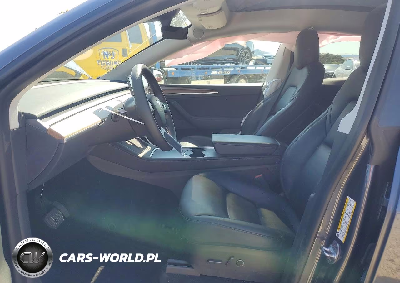 2023 Tesla Model Y VIN:7SAYGAEE6PF619760 - 7