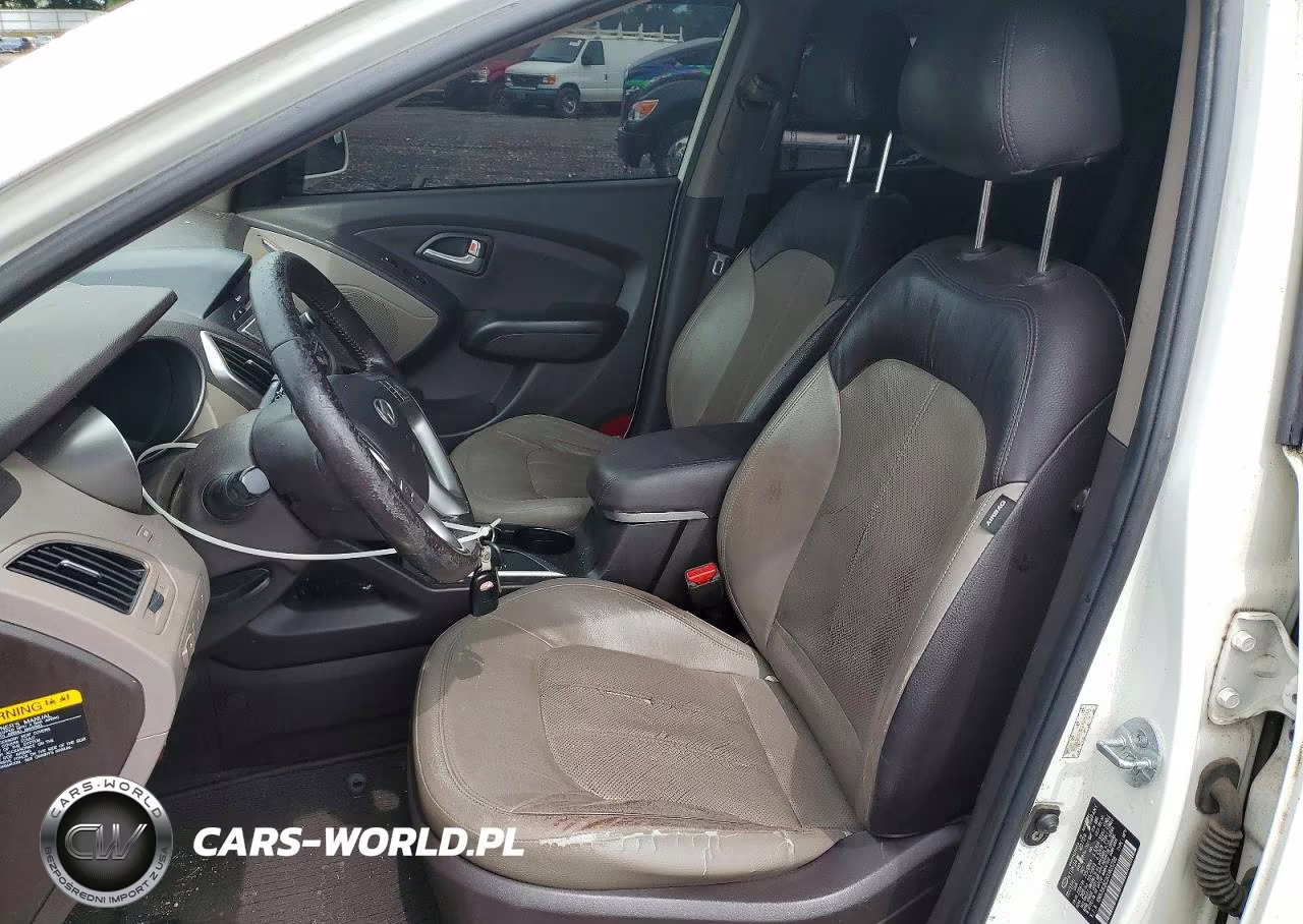 2012 Hyundai Tucson Limited VIN:KM8JUCAC0CU405268 - 7