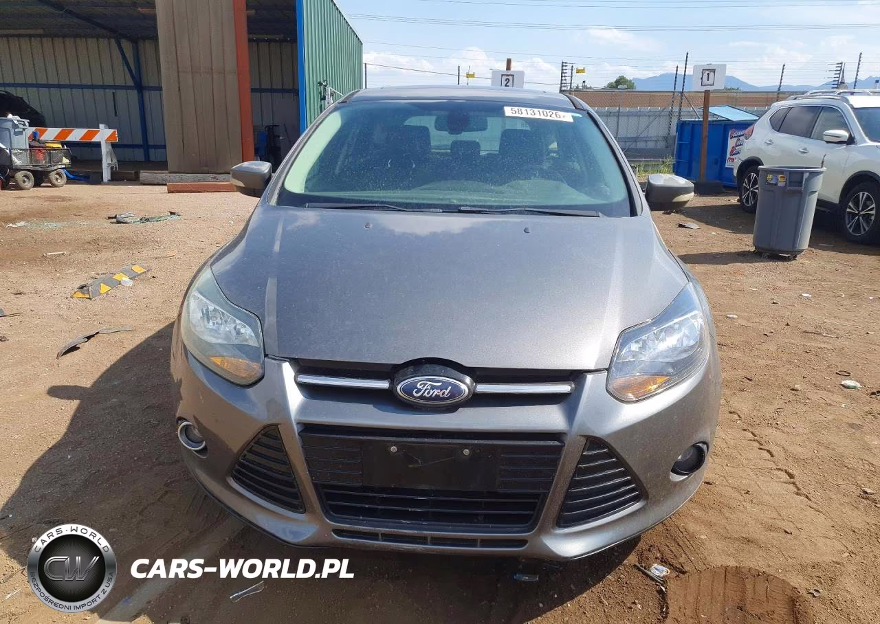 2012 Ford Focus Titanium VIN:1FAHP3N23CL330122 - 5